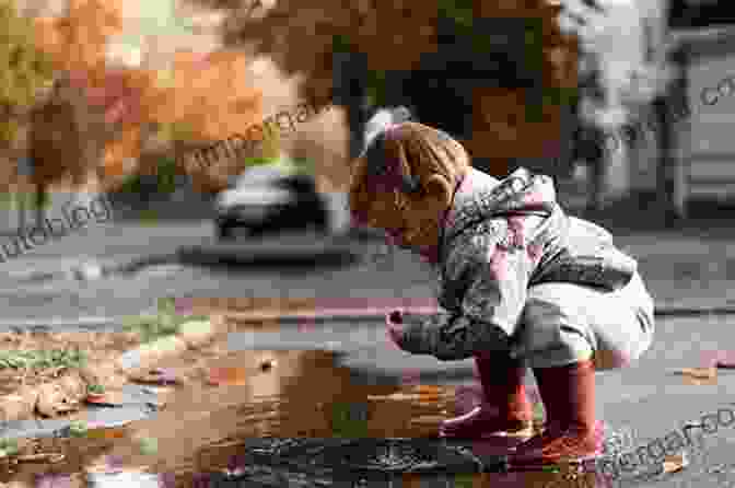 A Poignant Photograph By FX John, Featuring A Child Playing In A Puddle FX: John S Photobook John Hartig