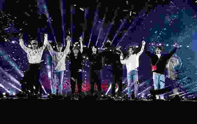 BTS Performing On Stage, Surrounded By A Sea Of Fans BTS The Review: A Comprehensive Look At The Music Of BTS