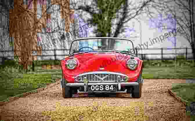 Daimler SP250 Parked In Front Of A Brick Wall. Daimler SP250: New Edition Brian Long